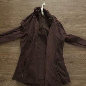 Lightly worn. Twice maybe. Lulu lemon zip up size 8